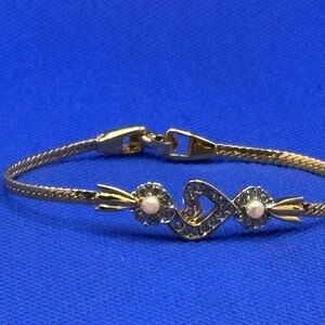 Nina Ricci gold, pearl and crystal bracelet